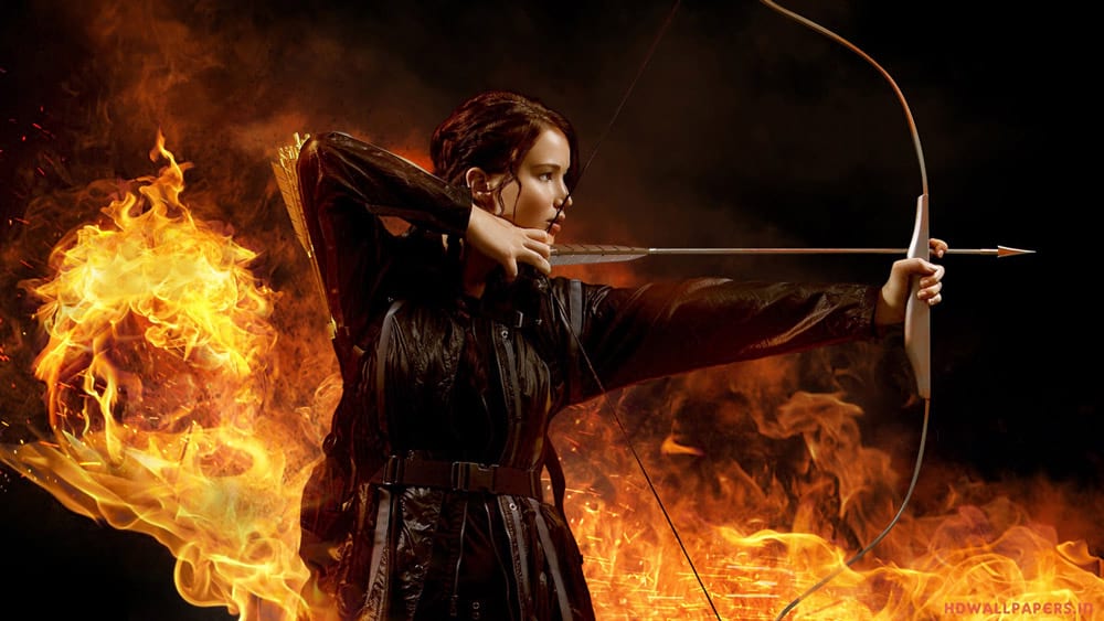 Jennifer Lawrence tire à l'arc dans Hunger Games 2